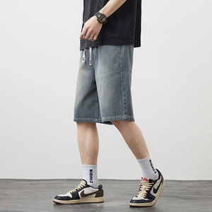 Short en jean large pour homme avec délavage étoilé et cordon de serrage blanc