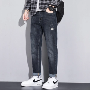 Men's slim fit dark grey denim jeans with geometric print and stylish cuffed hems