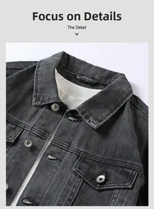 Détail des boutons métalliques et de la poche poitrine sur veste en jean anthracite
