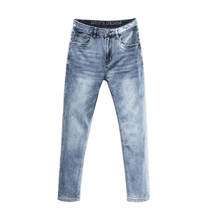 Men's slim straight fit light blue washed denim jeans with vintage faded finish