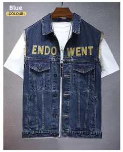 Detail of blue denim vest featuring yellow embroidery and classic flap pockets with buttons