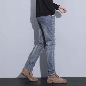 Distressed slim straight jeans for men with vintage blue wash and ripped details