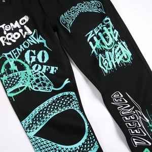 Men's slim stretch black jeans featuring vibrant graffiti prints and snake patterns