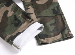 Detail of camouflage cargo pants leg showing durable hem stitching and inner white twill fabric