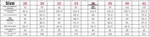 Detailed size chart for vintage washed flared denim jeans with measurements in cm