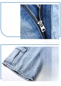 Dettaglio della cerniera metallica e dell'orlo dei pantaloncini cargo in denim blu chiaro