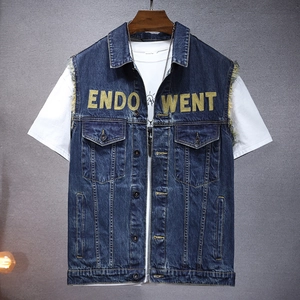 Men's retro wash denim vest with raw edges and embroidery on a grey background