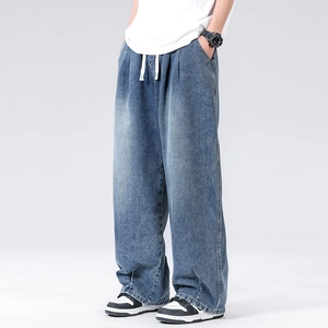 Men's wide-leg denim jeans in washed blue with drawstring waist and straight-cut fit