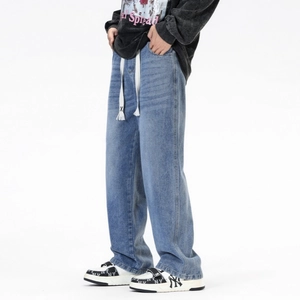 Jean denim ample à jambes larges pour hommes avec cordon blanc et finition bleu délavé