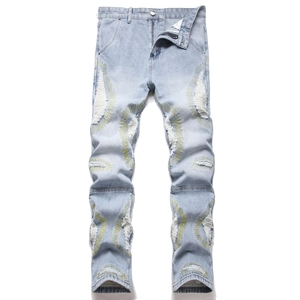 Men's slim straight light blue jeans with distressed rips and yellow starburst embroidery