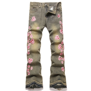 Men's vintage washed stretch flared jeans with pink cherry blossom floral embroidery