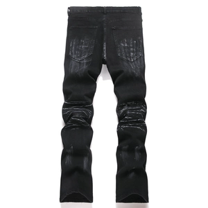 Men's slim fit black flare jeans with washed distressed finish and street style look