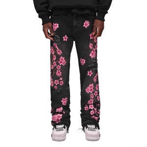 Men's washed black flared jeans with cherry blossom embroidery and distressed details