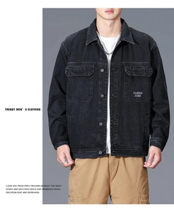 Detail of black washed denim cargo jacket featuring classic collar and chest flap pockets