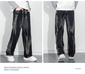 Vues détaillées avant et arrière du jean noir délavé à l'acide avec texture vintage