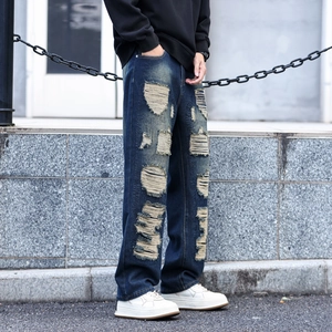 Jean bleu homme coupe droite décontractée avec détails déchirés vintage et délavés