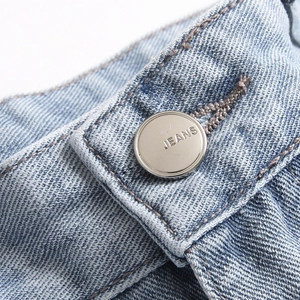 Men's slim straight denim pants with detailed jeans button and blue twill cotton fabric