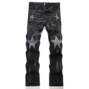 Men's high street black distressed denim pants with silver star patches and studs