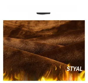 Detail shot of soft brown thermal fleece lining for men's winter denim jeans