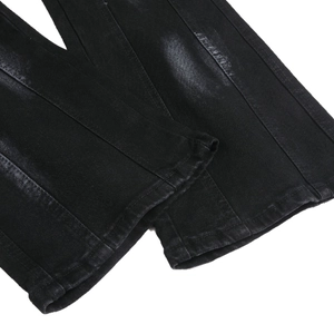 Men's slim fit black flared jeans with contrast stitching and industrial denim texture