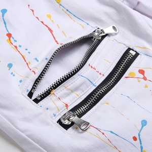 Slim fit white men's casual jeans with colorful paint splatter and metal zippers