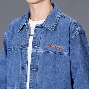 Men's casual mid-blue denim jacket with orange chest embroidery and metal buttons
