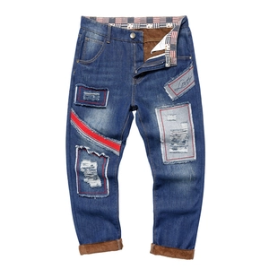 Men's blue distressed wide leg jeans with warm fleece lining and patch details