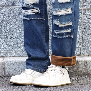 Men's loose straight-leg jeans with distressed patches and warm fleece lining