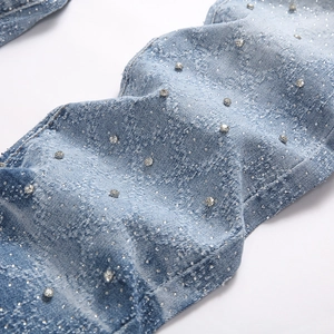 Light blue flare jeans for men with silver rhinestones and washed denim texture