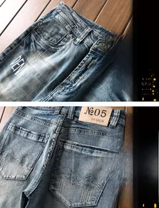 Détails du short en jean pour homme avec effet délavé et écusson logo en cuir