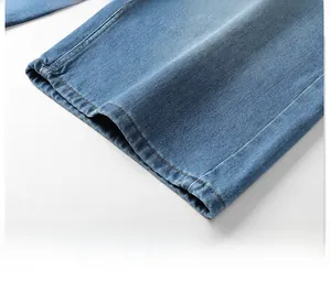Close-up of straight-leg denim hem with classic yellow double-stitch sewing details