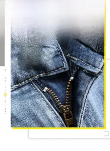 Détails de haute qualité du jean bleu foncé avec fermeture éclair YKK et bouton métal