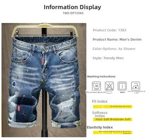 Détail du short en jean vieilli avec taches de peinture, patchs et étiquette rouge