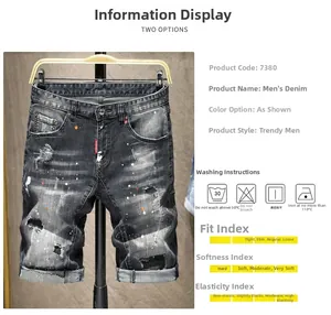 Dettaglio di pantaloncini di jeans grigi con schizzi di vernice, strappi e risvolti