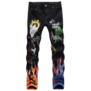 Men's black slim fit jeans with 3D graffiti skulls and colorful flame prints on fabric