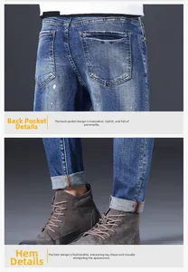 Detail of blue denim jeans with white paint splatters and red-blue contrast hem stitching
