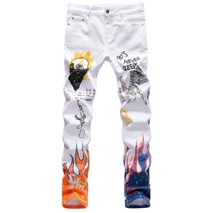 Men's slim white streetwear jeans with skull prints and asymmetric flame hem design
