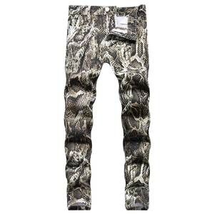 Men's slim fit snake print denim jeans with realistic snakeskin pattern and metal button