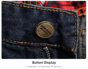 Detail of high-density blue denim with brass fashion button and contrast yellow stitching