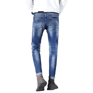 Slim fit men's blue washed jeans with embroidery print and white ink splash design