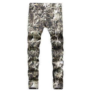 Slim fit men's snake skin print denim jeans in brown and beige python pattern