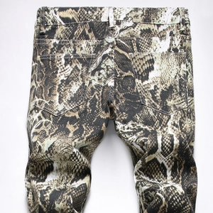 Men's slim fit snake skin pattern printed denim pants featuring realistic python texture
