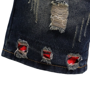 Men's retro distressed denim shorts with ripped patches and red plaid fabric inlay
