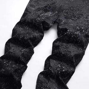 Men's slim fit black pants with white graffiti marble pattern and street style print