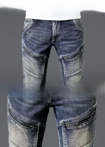 Detailed close-up of retro blue denim jeans featuring symmetrical double zipper design