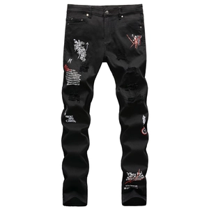 Jean slim noir extensible avec imprimés graffiti, broderies et détails usés