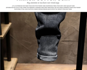 Detail of slim fit black denim leg showing French cotton texture and inner stitching