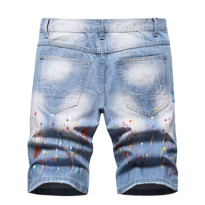 Short en jean bleu clair pour hommes avec touches de peinture colorée et usure