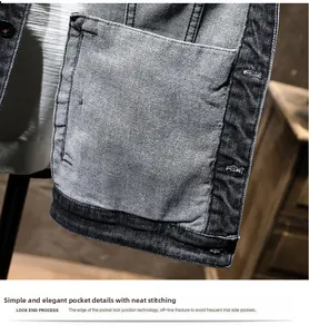 Detail view showing grey denim jacket inner pocket construction and precision stitching