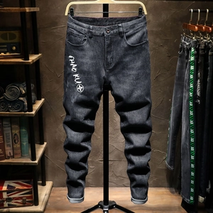 Slim fit charcoal black embroidered jeans for men with vintage wash and street style prints